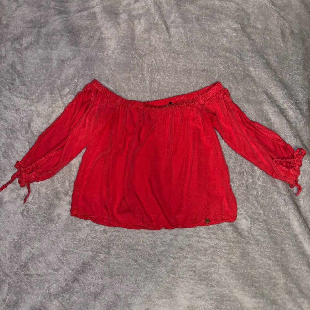 Casual, red, and off the shoulder top with open sleeves